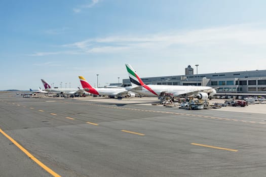 Boston, USA - September 11, 2017: Emirates aircraft at terminal at Boston Logan international airport, USA.