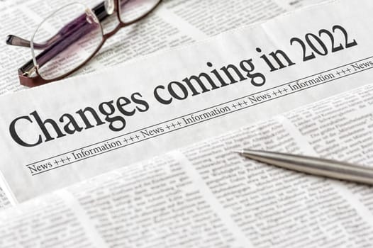 A newspaper with the headline Changes coming in 2022