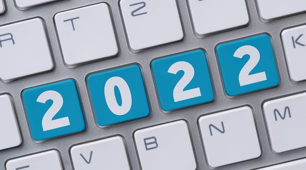 A computer keyboard with the word 2022