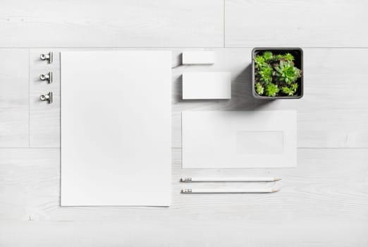 Branding stationery mockup on wooden background. Blank objects for placing your design. Flat lay.