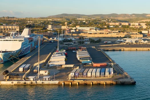 Civitavecchia, Italy - February 02, 2025: A Mediterranean port with cargo handling facilities, illustrating trade and logistics in one of Italy main transportation hubs. Concept: economy, port, trade.