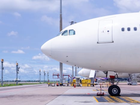 Airplane near the terminal in an airport cockpit