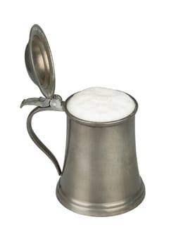 Metallic beer mug with beer isolated on white