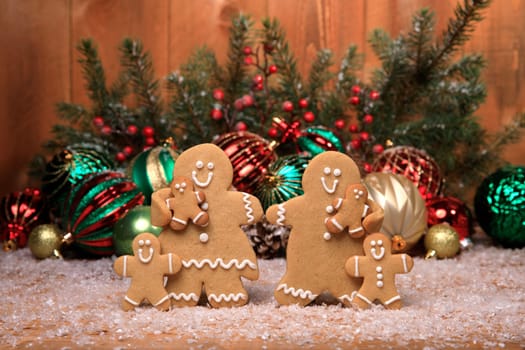 Gingerbread Family of 4 kids on Holiday Christmas Background