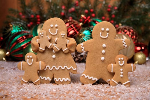 Gingerbread Family of 4 kids on Holiday Christmas Background