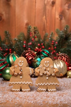 Gingerbread Family of 3 kids on Holiday Christmas Background