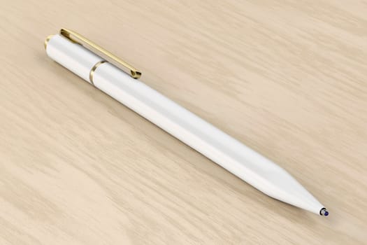 White pen on wooden desk