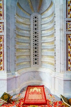 Muscat, Oman, December 4, 2016: The mihrab in the main prayer hall at the Mosque Muhammad al-Amin
