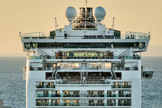 Civitavecchia, Italy - February 6, 2025: The top of a cruise ship with decks, amenities and ocean scenery. Ideal for promoting travel, tourism and maritime experiences.