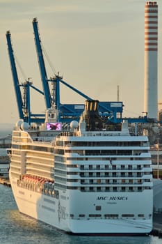 Civitavecchia, Italy - February 6, 2025: View of a cruise ship in Civitavecchia, Italy, with decks and amenities visible in front of a calm sea. Suitable for travel, tourism and maritime industries.