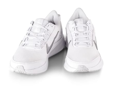 KAMCHATKA, RUSSIA- OCTOBER 18, 2021: NIKE Renew - Pair White Leather Walking Women SNEAKERS on white background