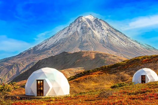 The White glamping on the slope of a volcano in autumn on the Kamchatka Peninsula. Selective focus