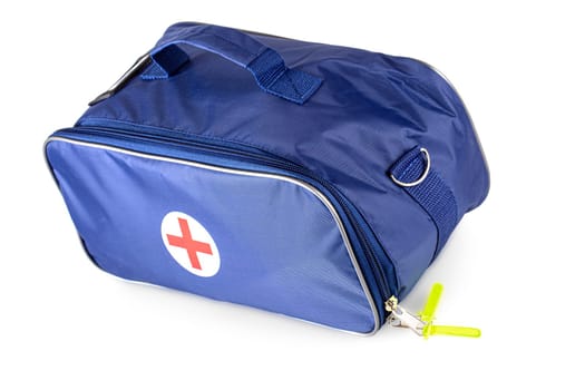 The blue medical bag with red cross isolated on white