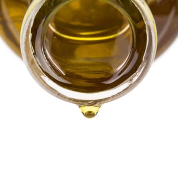 Oil drop on a bottle. Oil pouring from a bottle