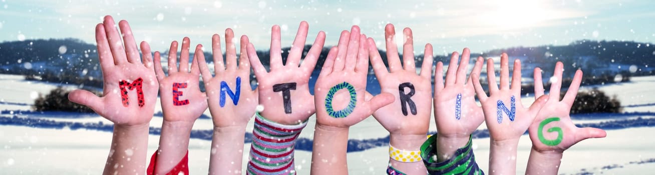 Children Hands Building Colorful English Word Mentoring. Snowy Winter Background With Snowflakes
