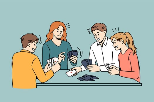 Friendship and leisure games concept. Group of young smiling friends sitting and playing cards together over blue background vector illustration