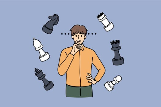 Thinking of strategy and chess concept. Young man cartoon character standing thinking with chess figured flying around vector illustration