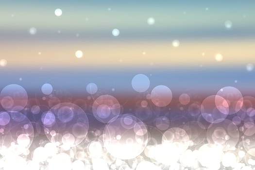 Abstract blurred festive light blue yellow pink winter christmas or Happy New Year background with shiny blue and white bokeh lighted snowflakes. Space for your design. Card concept.