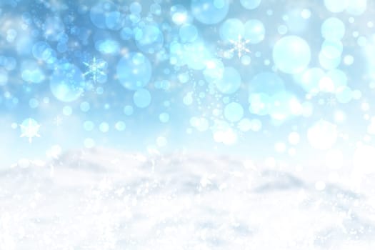 Abstract blurred festive winter christmas or Happy New Year background with shiny blue and white bokeh lighted snow landscape with sky. Space.