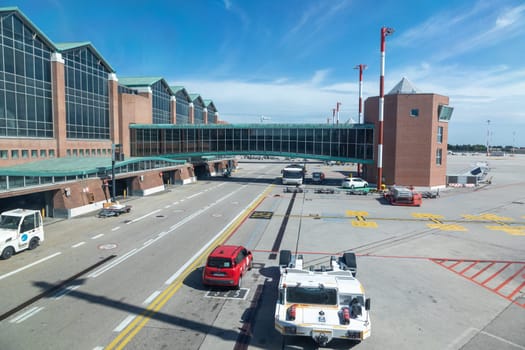 venice, Italy - July 1, 2021: apron at the  Venice Airport Marco Polo with modern departure hall.