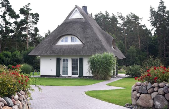 Friesenhaueser with thatched roof made of reeds. Friesenhaueser with thatched roof made of reeds.