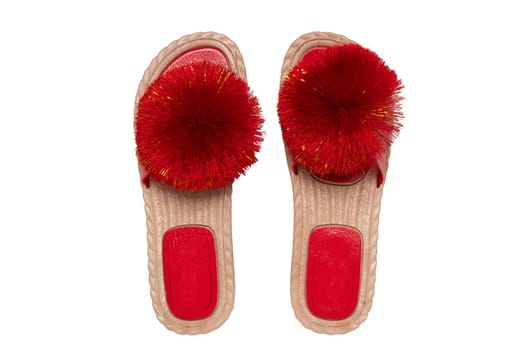 Womens boots and shoes. Top view of a pair women slipper with red pompoms isolated on a white background. Fashion of sandals.