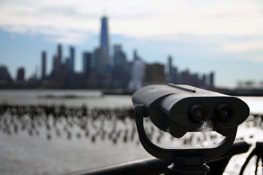 The binoculars which point towards downtown New York City from the other side of the river in Jersey city