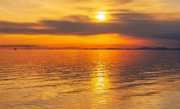 The sunset at sea. variety of colors and hues of the rising sun. Selective focus