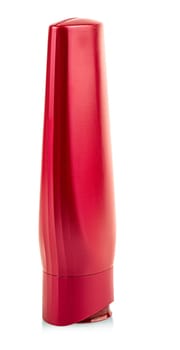 The red  Plastic Bottle with Shampoo or hygienic cosmetic product isolated on white background