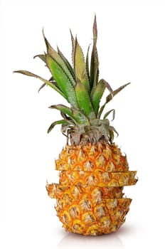 Stacked stack of sliced pineapple slices isolated on white background