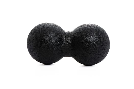 black double massage ball close-up for yoga on white isolated background. High quality photo