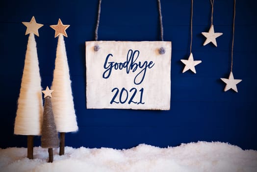 Christmas Decoration Like White Tree With Star On Blue Background. White Snow On Ground. Sign With English Calligraphy Goodbye 2021