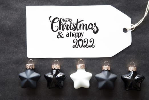 Label With English Calligraphy Merry Christmas And A Happy 2022. Black Christmas Ball Ornament.