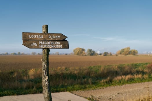 Signpost on the popular Elbe cycle path between the city of Magdeburg and the village of Lostau in Germany