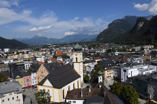 A panoramic view of the town of Kufstein in Tyrol,Austria. The city is located in the Inn Valley and is the border town to Kiefersfelden,Germany. In the foreground the parish church of St. Vitus and the town hall.