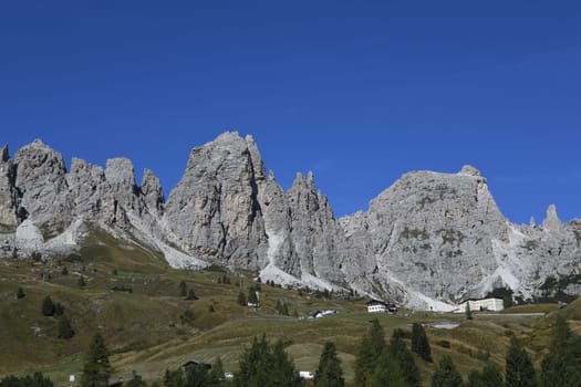 Panoramic view of the Gardena Pass and the pass road in the South Tyrolean Dolomites. It connects Val Gardena in Val Badia and the municipalities of Selva,Corvara,Colfosco and Alta Bad