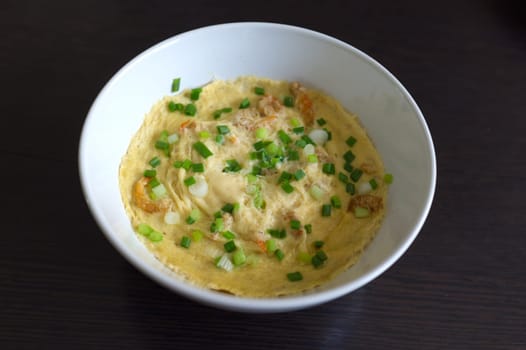 Steamed Egg or Kai thoon  (Thai foods), Chawanmushi (Japanese foods) on black  floor