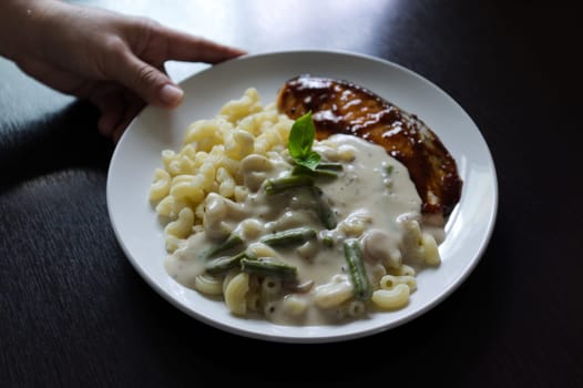 salmon steak white sauce macaroni and vegetable