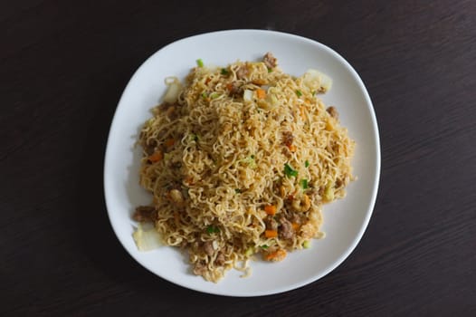 Fried instant noodle with carrot  and pork