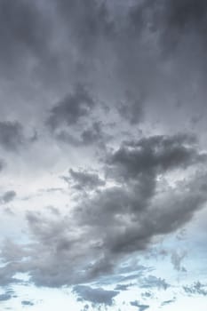 Black clouds hanging in the sky are a sign of overcastity. Dramatic sky.