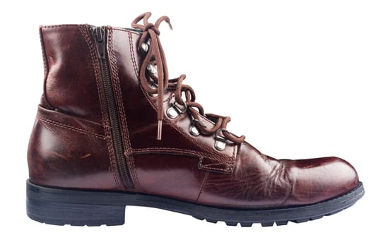 side view closeup of polished vintage brown leather boot isolated on white background