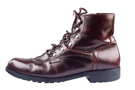 side view closeup of polished vintage brown leather boot isolated on white background