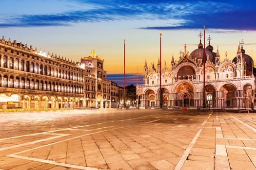 Venetian Basilica San Marco and the Clocktower in the Square Piazza San Marco, Italy.
