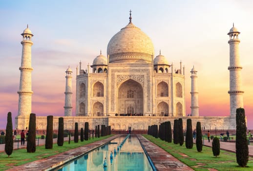 Beautiful Taj Mahal at sunrise and its reflection, India, Agra.
