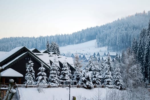 beautiful resort town of Bukovel in winter, the theme of mountain sports, skiing, Bukovel, Carpathian mountains Ukraine, new year, Christmas, holidays