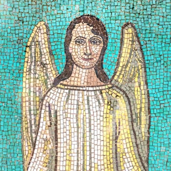 Mosaic depicting a smiling angel. Advent, Christmas, Easter concept.