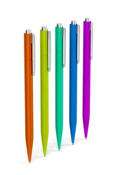Group of pens with different colors on white background