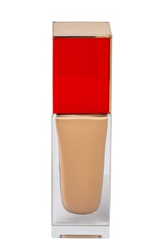 Cosmetic foundation isolated. Close-up of an closed glass bottle with liquid skin foundation isolated on a white background. Makeup concept of moisturiser and toner creme. Macro.
