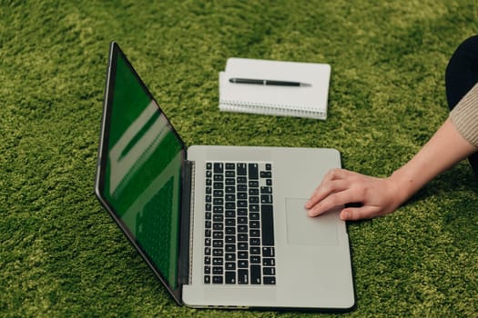 Close-Up Shot of Human Hands Placed Over Laptop.