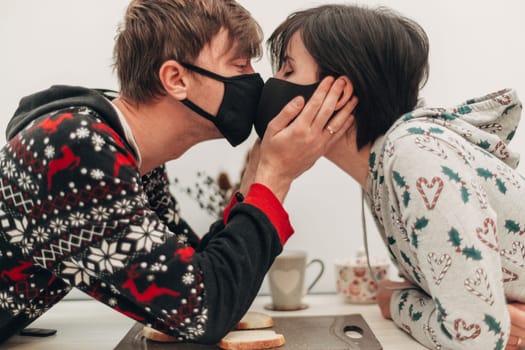 Girl and Boy Kissing in Masks on Coronavirus Quarantine.